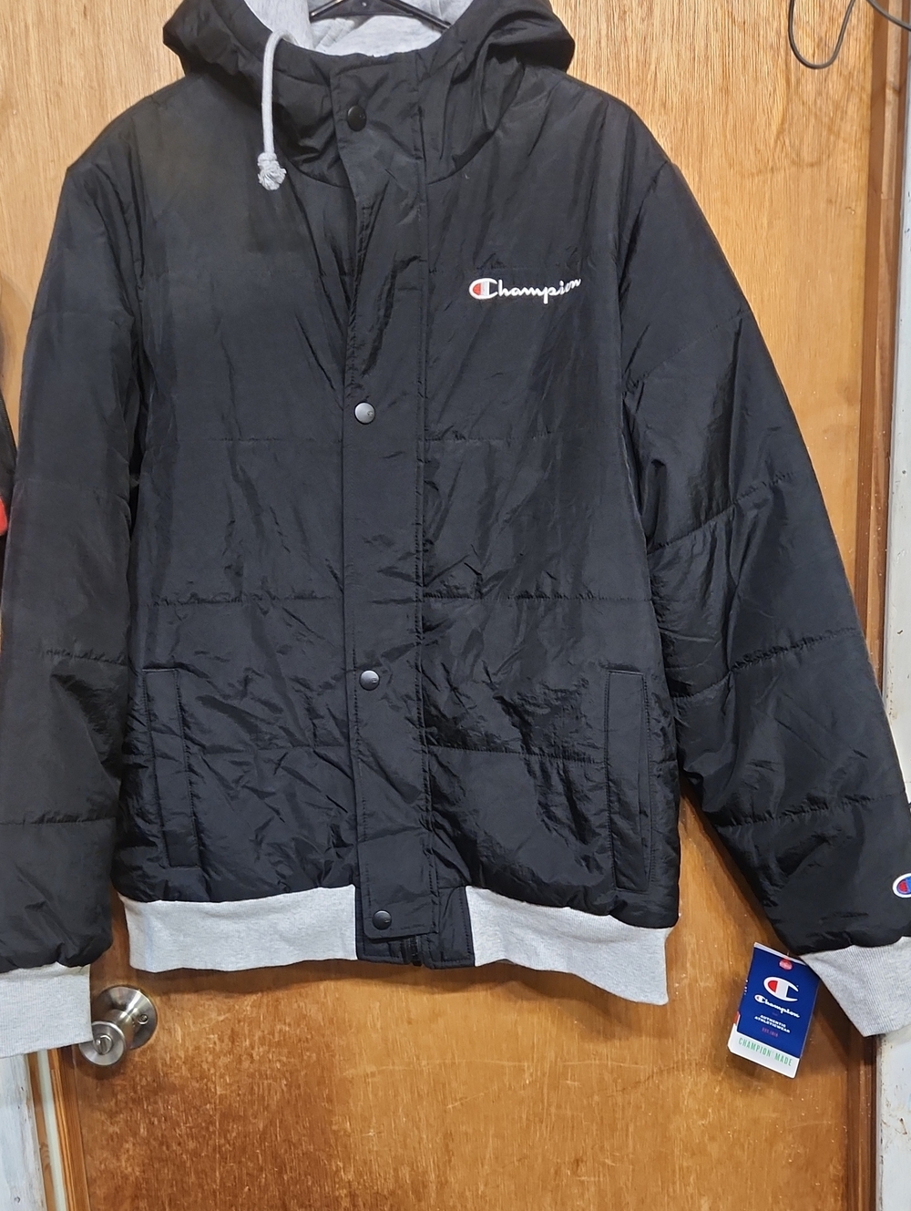 Champion Black Hooded Puffer Jacket with Gray Ribbed Trim